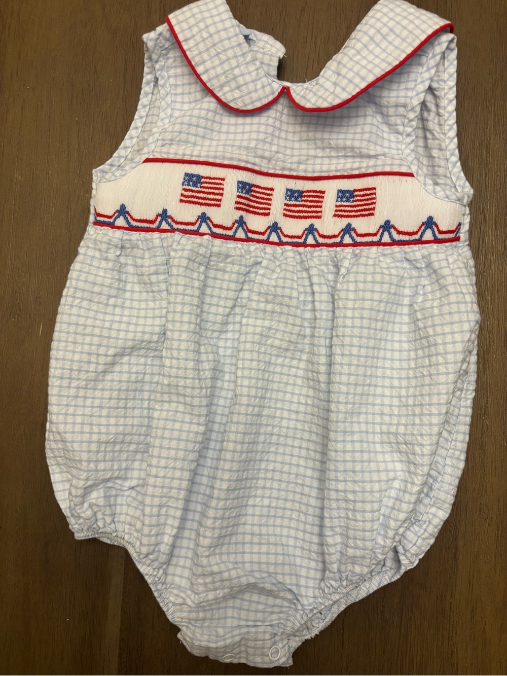 Girls One-Piece Romper with Blue Gingham and Red-Trim Flag Smocking